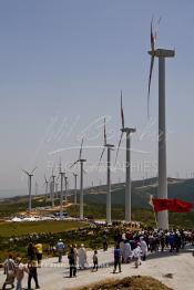 Image du Maroc Professionnelle de  La région de Melloussa au sud-est de Tanger voit aujourd'hui son identité enrichie par le parc éolien Khalladi de 120 MW, le plus grand d'Afrique, dont le coût global s'élève à 2,75 MMDH  après son inauguration par SM le Roi du Maroc Mohammed VI, Lundi Juin 28, 2010. (Photo / Abdeljalil Bounhar)


